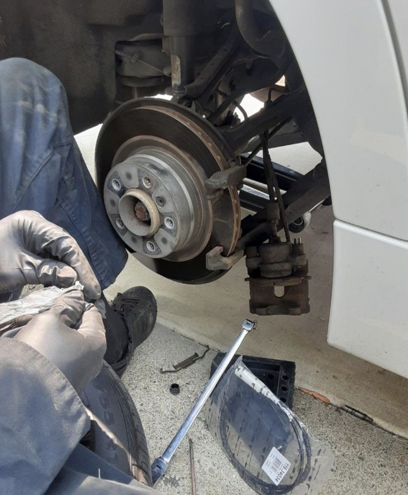 Brake job underway at a Jenks driveway near Tulsa