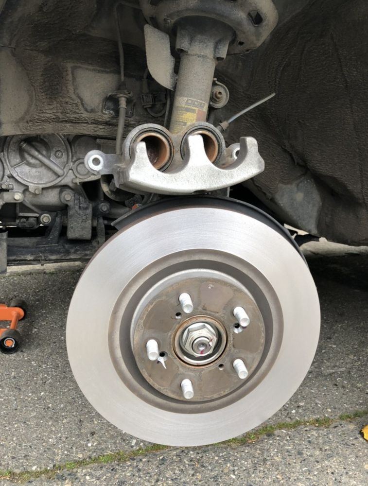 Fresh rotor installed during a Tulsa driveway brake job