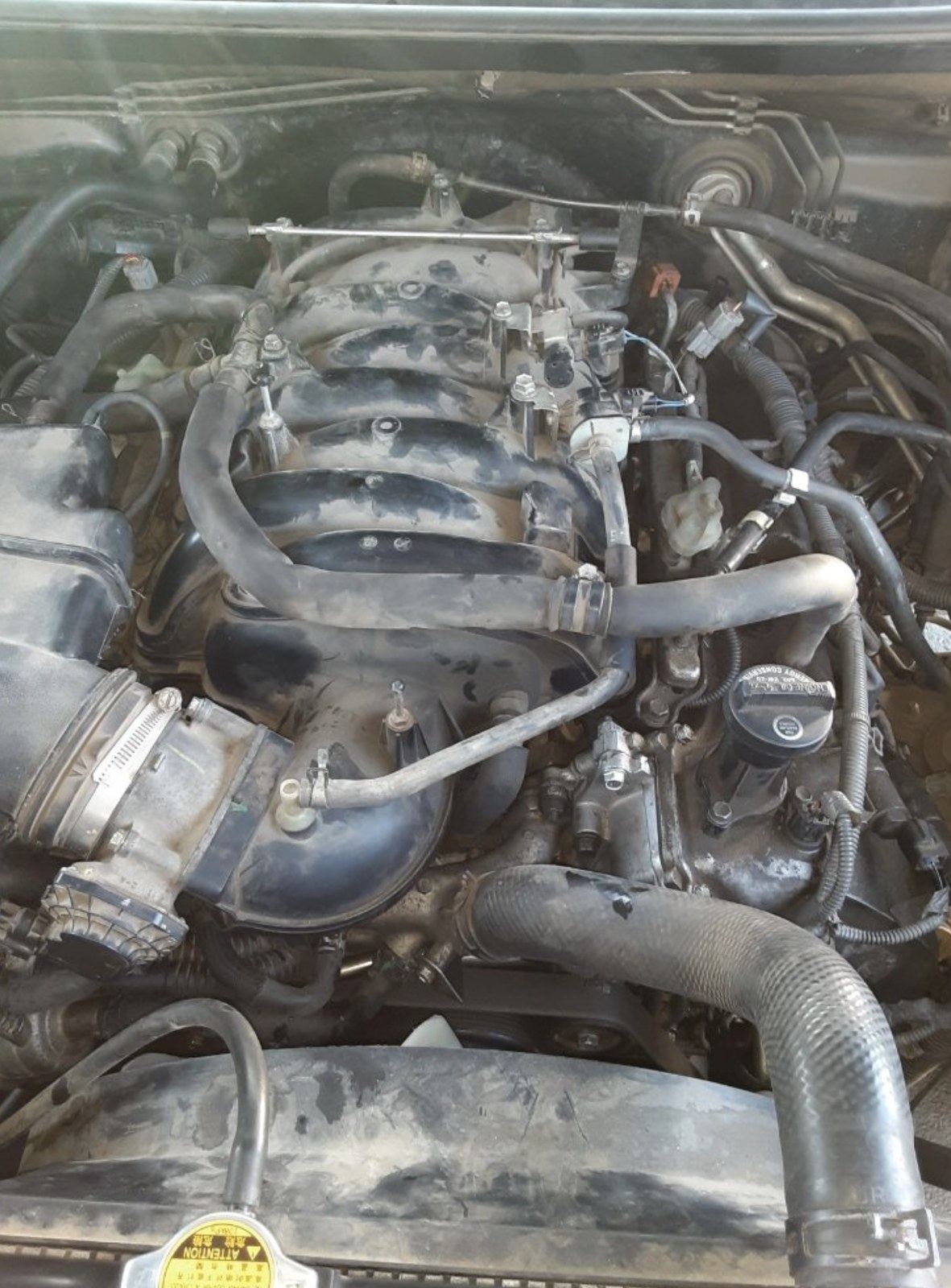 Engine work on a truck at a Sand Springs home near Tulsa